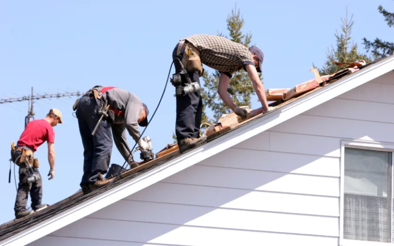 men working on the roof