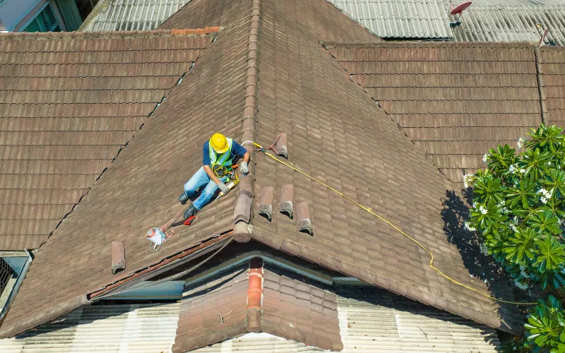 man working on the roof