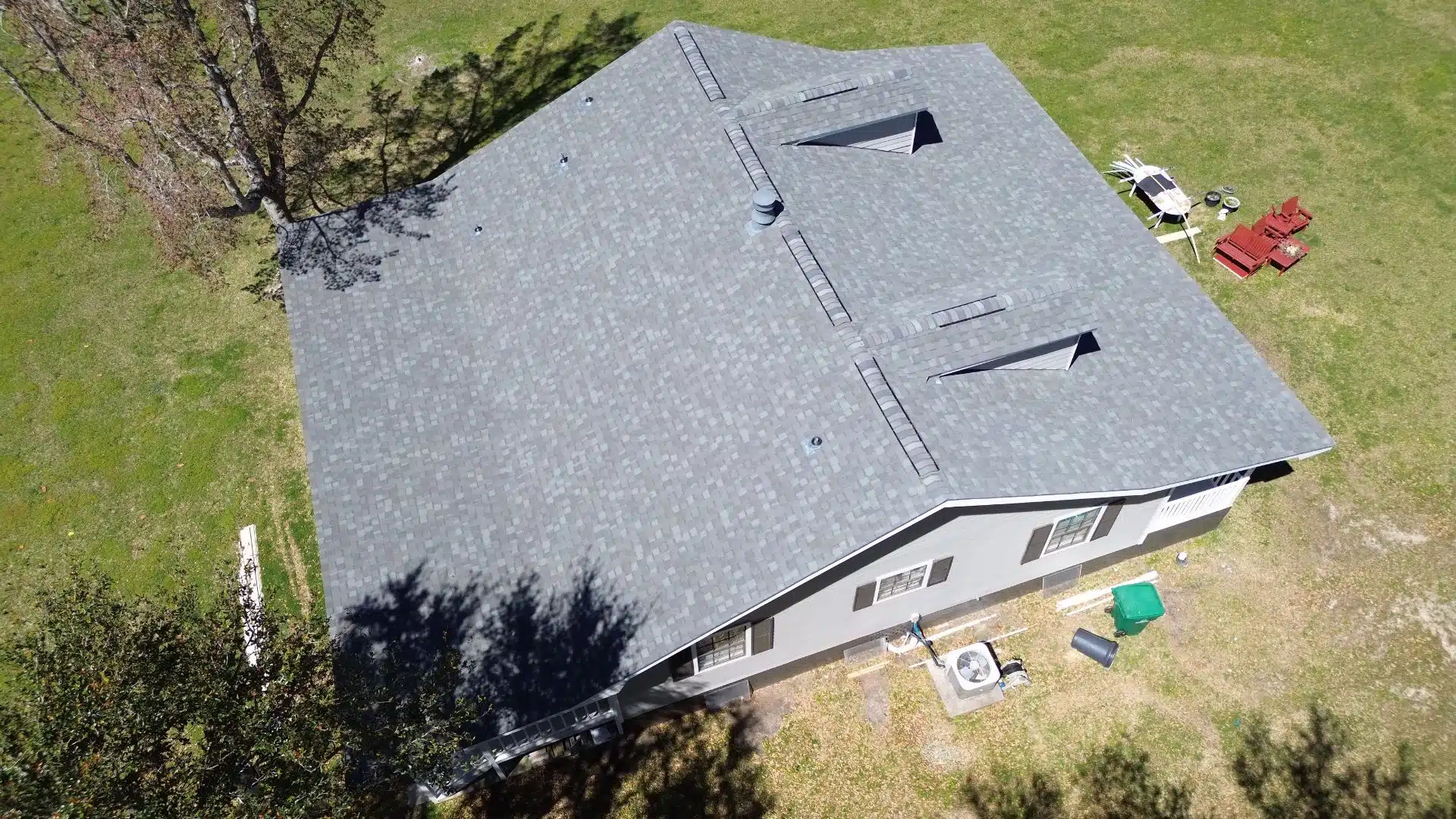Newly installed roof by Integrity Roofing, a roofing company in Gulfport MS, with high-quality asphalt shingles and ventilation systems