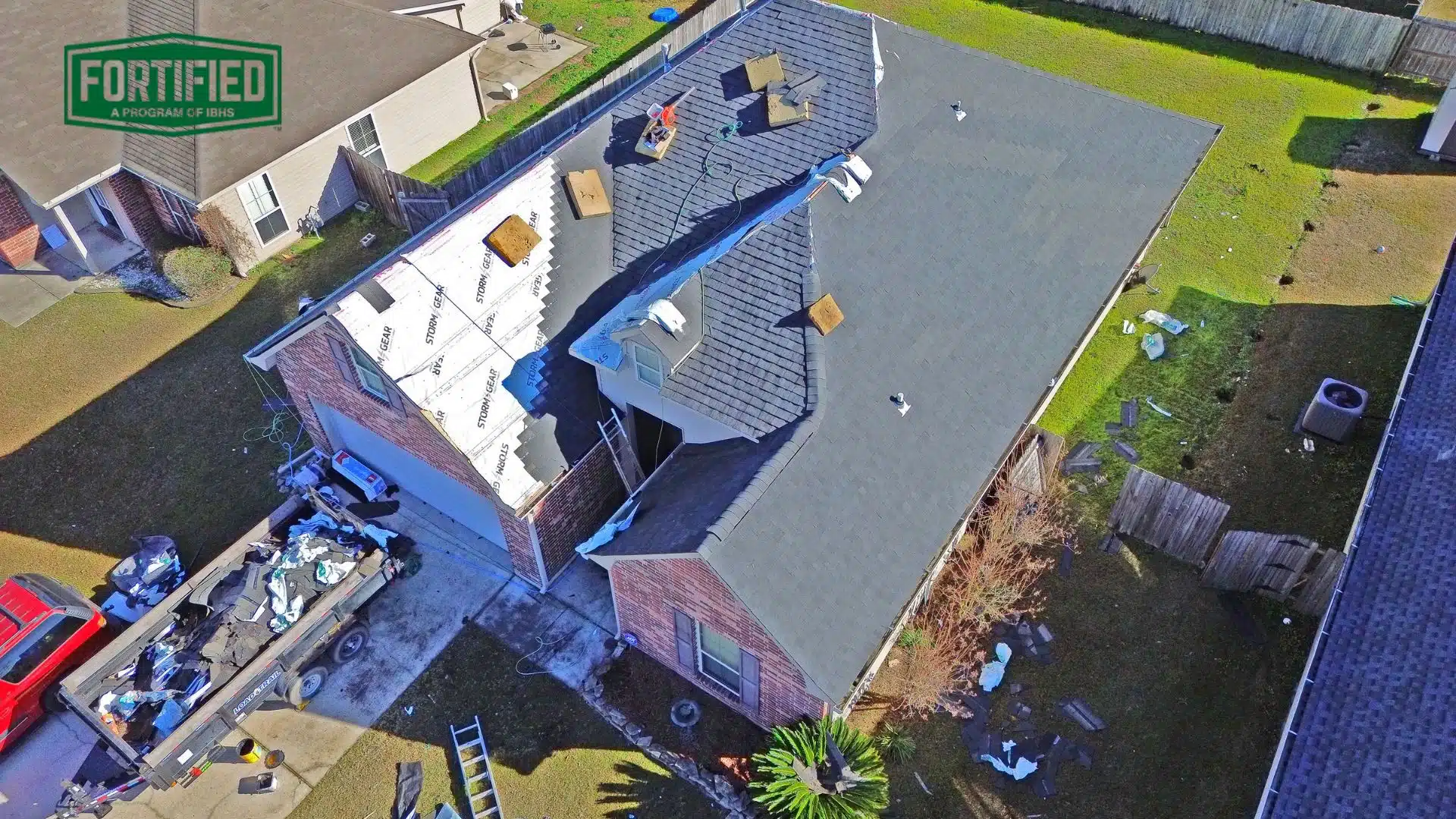 Certified roofing contractor in Gulfport MS installing ring-shank nails for storm-resistant FORTIFIED Roof