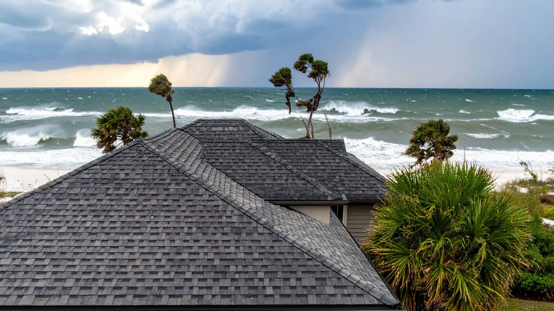 "Close-up of roof edge flashing and hurricane straps installed by a roofer Gulfport MS to protect against coastal wind uplift."