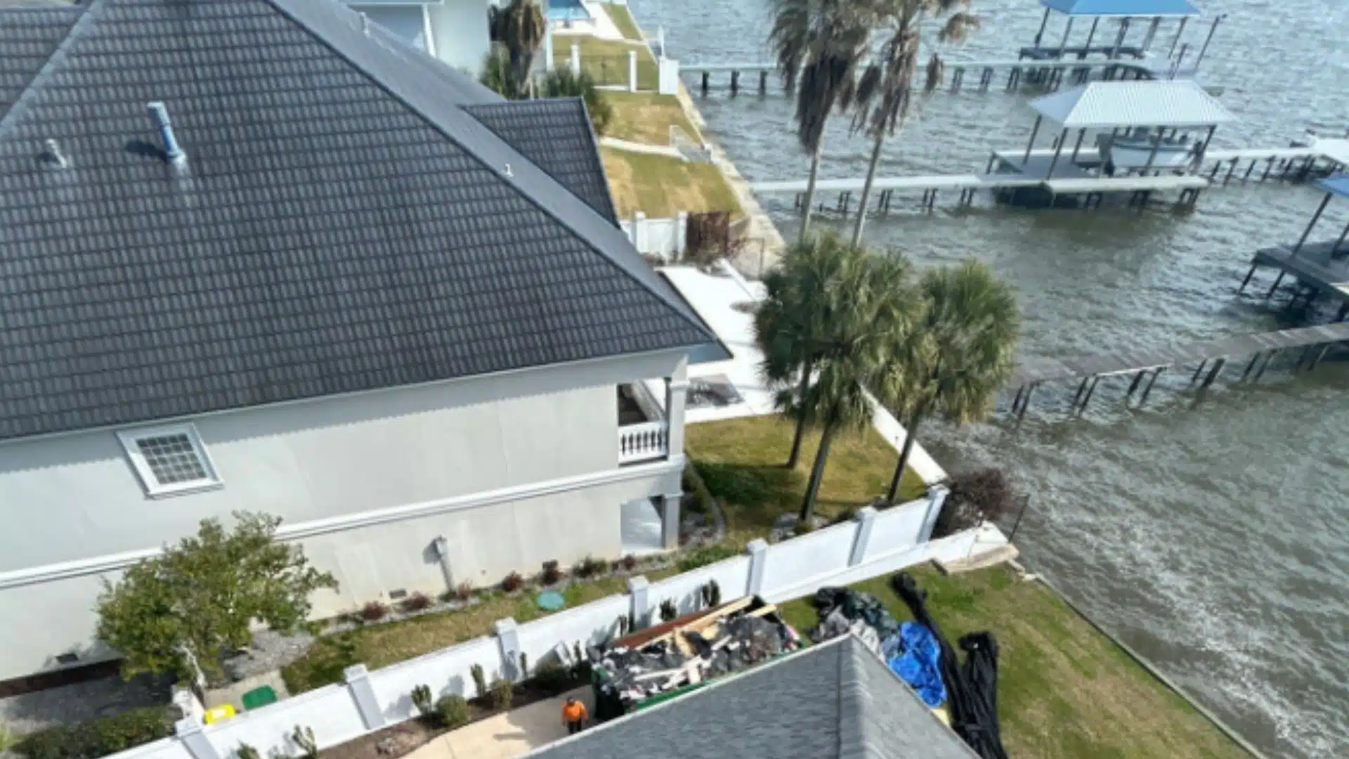 Roof inspection on a coastal home in Bay St. Louis MS showing how salt air can affect roofing materials and metal components