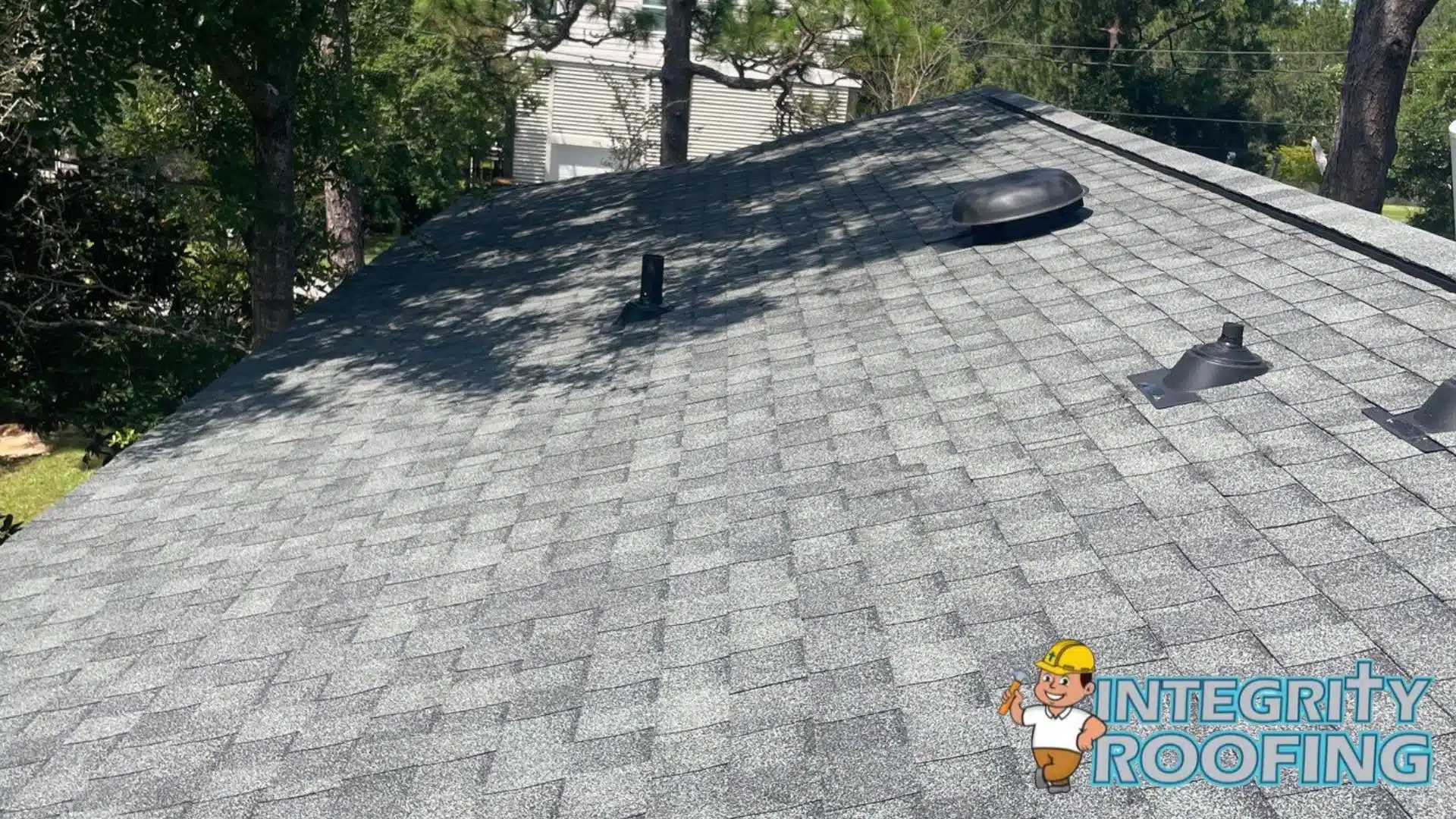 Installation of heavy-duty starter strips and drip edges along the rakes of a Pass Christian home.