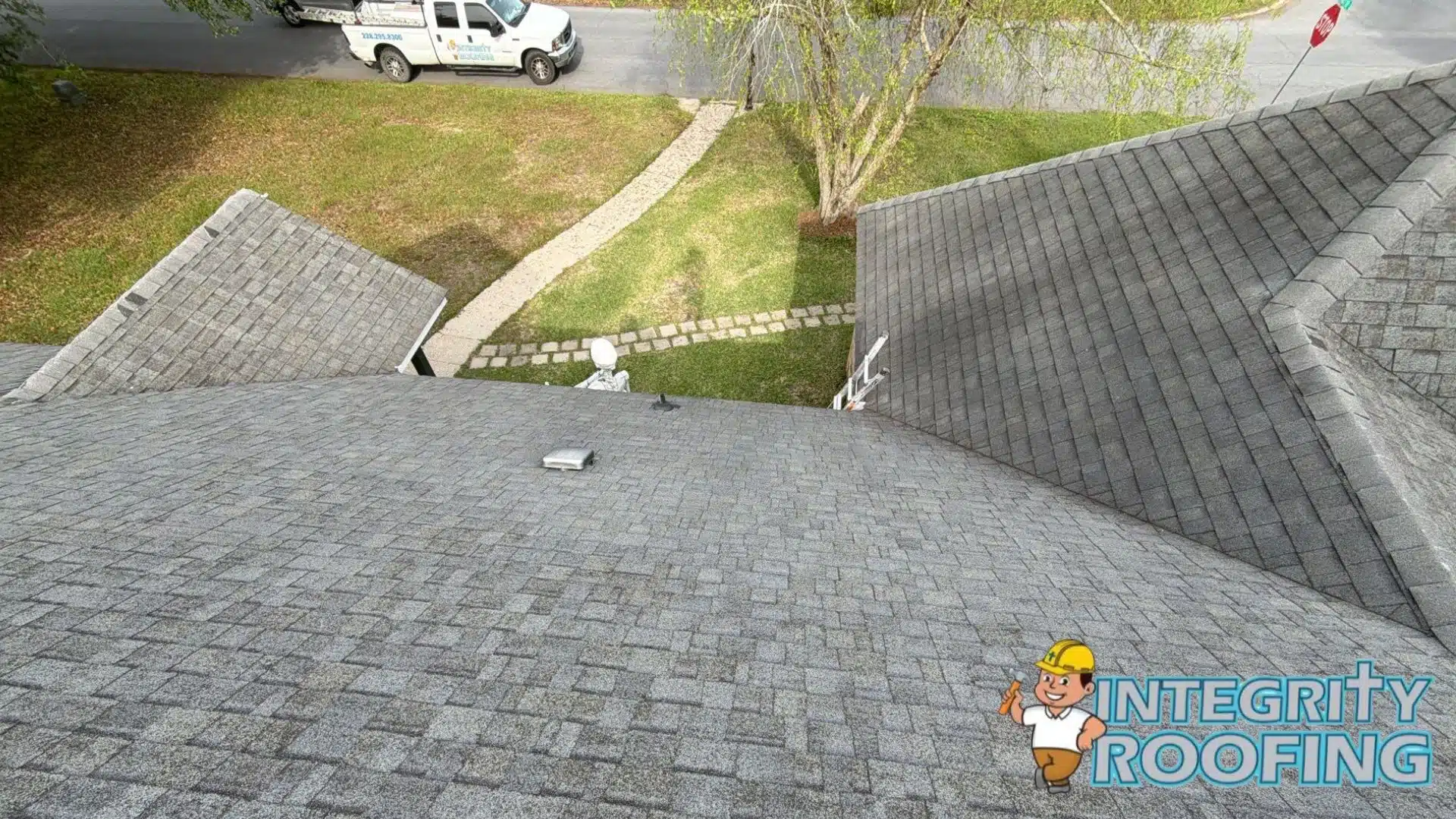 A professional roof inspection Diamondhead MS contractor identifying wind damage and granule loss on residential shingles after a Gulf Coast storm.